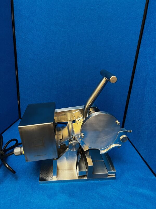 A stainless steel Chop Saw on a blue background.