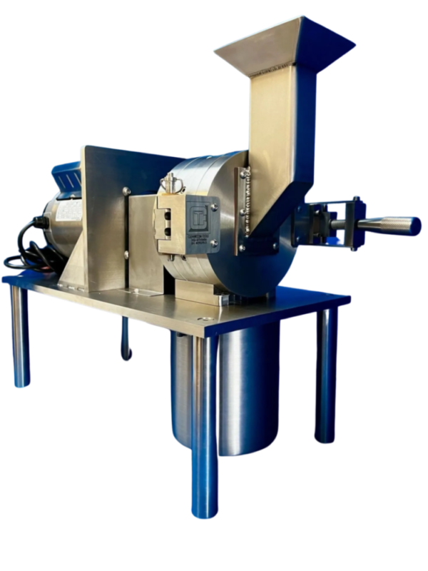 A stainless steel Bone Mills machine on a table with a black background.