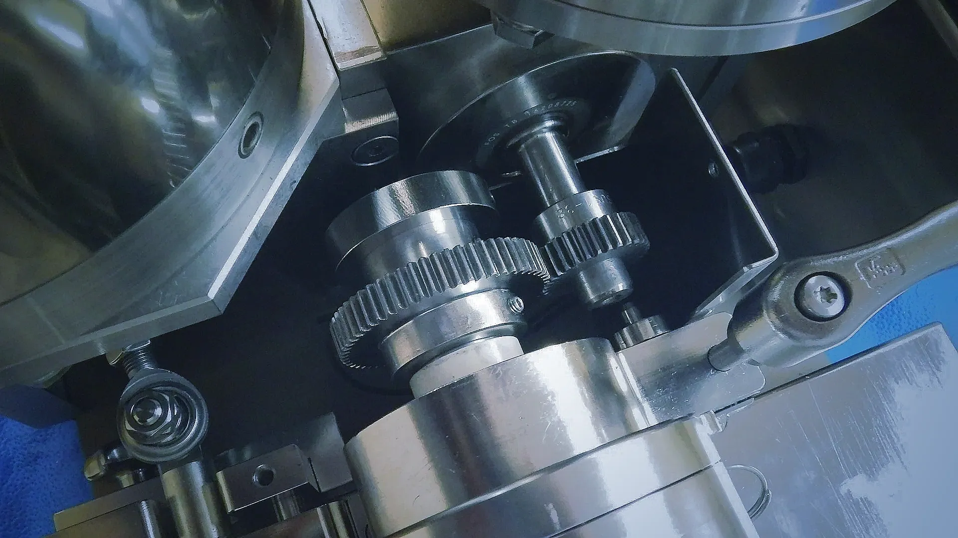 A close up of a machine with gears and tools.